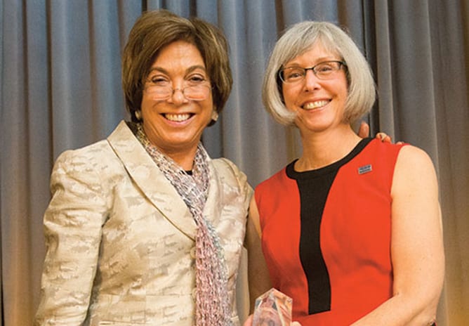 Prof. Laura Tyson and Gail Maderis, BS 78, recipient of the Cora Jane Flood award