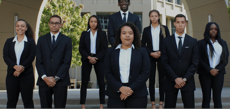 Character, (center), is executive of internal affairs for the Haas Undergraduate Black Business Association.
