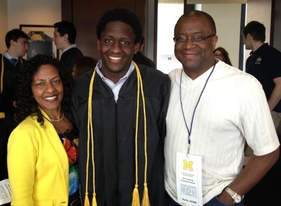 Hines with his parents at his University of Michigan undergraduate commencement in 2013.