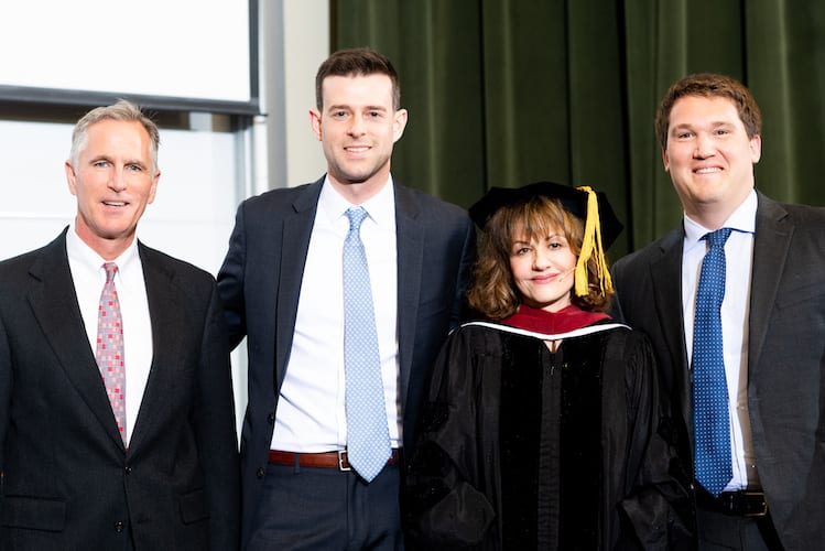 L-R: William Rindfuss, executive director of strategic programs in the Haas Finance Group, Daniel Clayton, MBA 19, Linda Kreitzman, executive director of the MFE Program, and Michael Bausback , MBA 19, at the Berkeley MFE commencement. Photo: Noah Berger / 2019