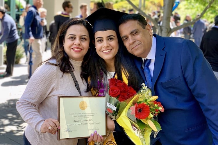 Jas with her parents.