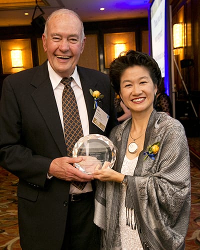 Miles with Ann Hsu, MBA 98, the 2012 Raymond E. Miles Alumni Service Award winner, at the Haas Gala