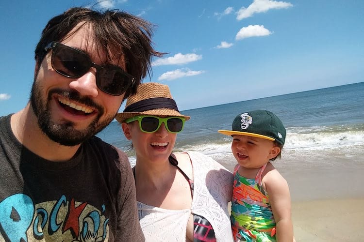 Brenda with her husband and son at the beach.