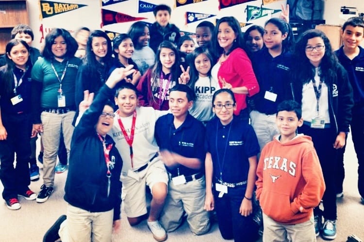 Paula (in the pink sweater!) with a group of her 5th grade students in 2014 at KIPP 3D Academy in Houston, Texas.