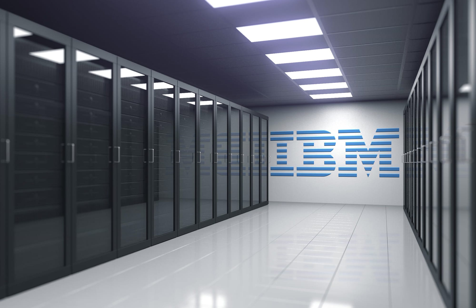 Logo of IBM on the wall of a server room