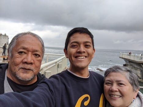 Augustine Santillan, MBA/MEng 21, and his parents.