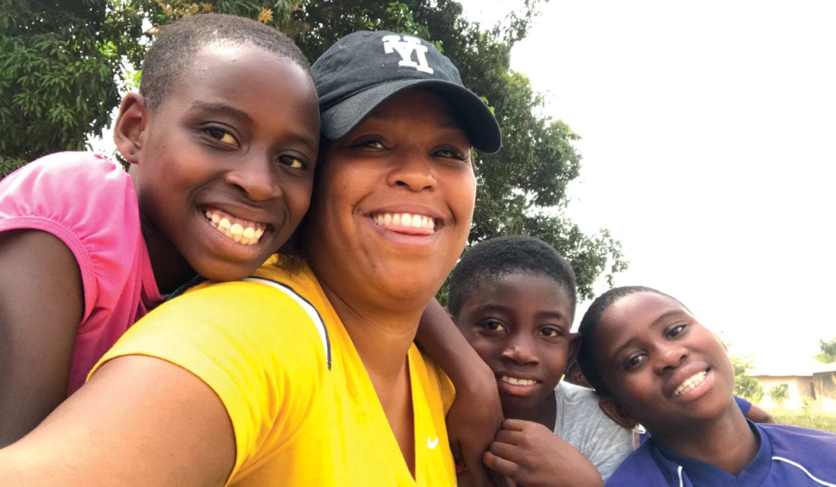 Rochelle Webb with friends from Happy Kids in Ghana (from left): Sefa, Rita, and Esonam.