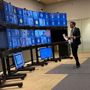 Lecturer Robert Strand, executive director of the Center for Responsible Business, tries out one of the four new Berkeley Haas virtual classrooms.