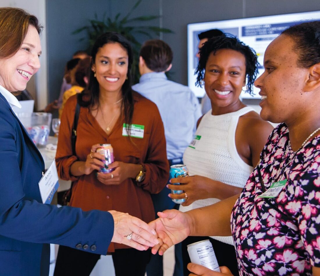 Dean Ann Harrison with Kimberly Mendez, Nicole Austin-Thomas, and Almaz Ali, MBA 21s, at the Berkeley Haas Consortium student welcome event in 2019.