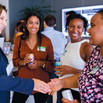 Dean Ann Harrison with Kimberly Mendez, Nicole Austin-Thomas, and Almaz Ali, MBA 21s, at the Berkeley Haas Consortium student welcome event in 2019.