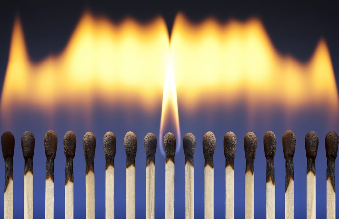 A group of lit matches