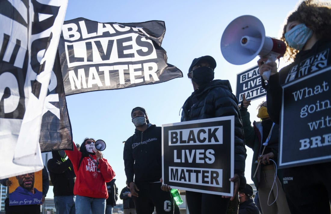 Black Lives Matter demonstrators march in St. Paul