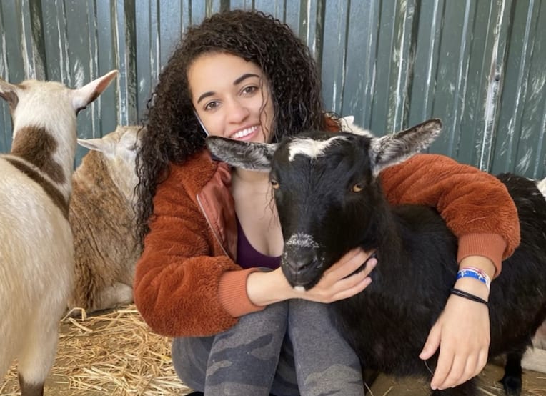Elle Wisnicki photo with goats