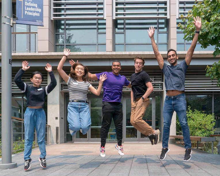MBA students jumping