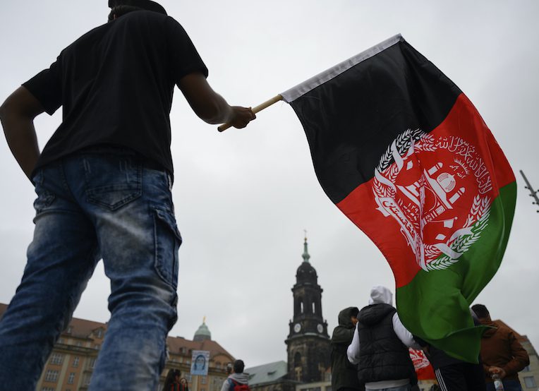 Man with Afghan flag