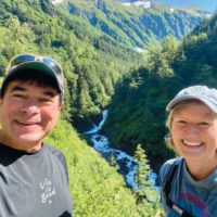 Stan and Amy Lujan, both MBA 91, hiking near their home in Juneau, Alaska.