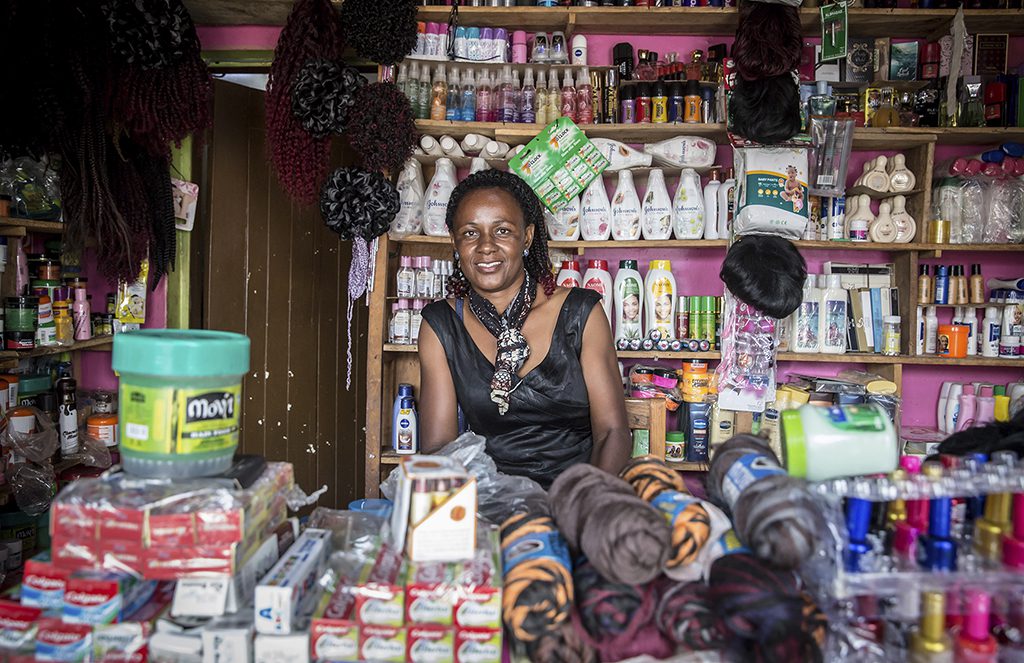 Shopkeeper Constance Akamo is pictured at her cosmetics shop in Uganda.