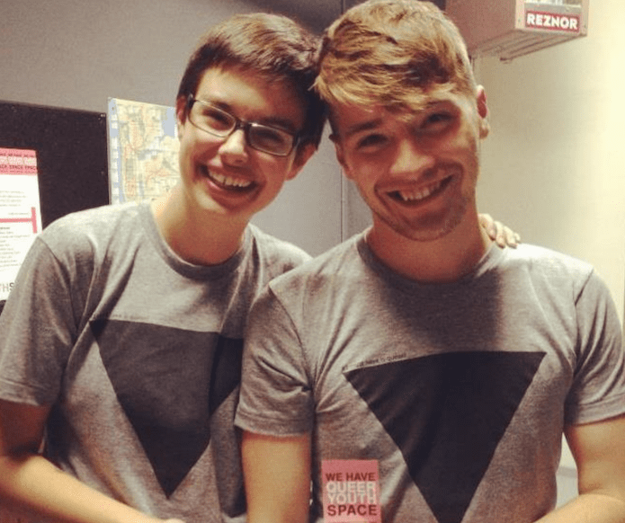Jude Watson with friend wearing triangle t-shirts in support of activism in Seattle
