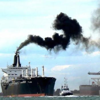 large ship polluting air.