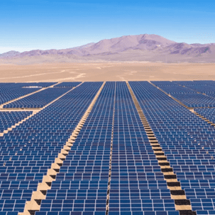 An array of solar panels in the desert