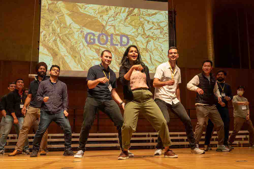 EWMBA students in the Gold cohort dancing