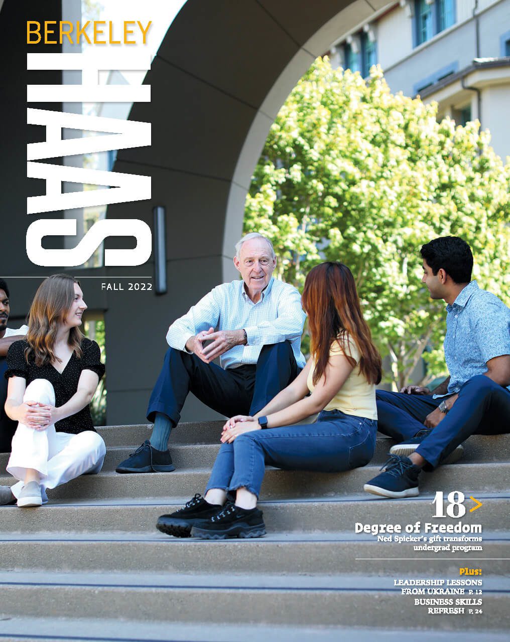 Cover of the fall 2022 issue of Berkeley Haas magazine showing three students sitting around an older man.