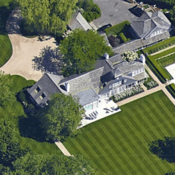 Aerial view of mansion with pool