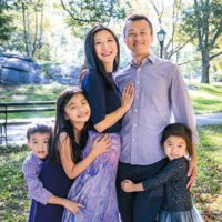 Amy Lei (center) with husband, Xin, and kids, Jack, Lucy, and Mia.
