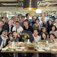 Atsushi Toda (front row, second from left, wearing Cal hat) with family and friends from the MBA classes of 1992, 1994, 1995, and 1996.