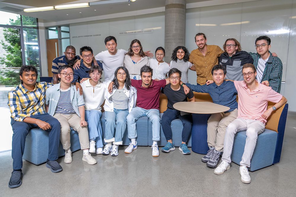 new Phd students at Haas in a group photo in Chou Hall