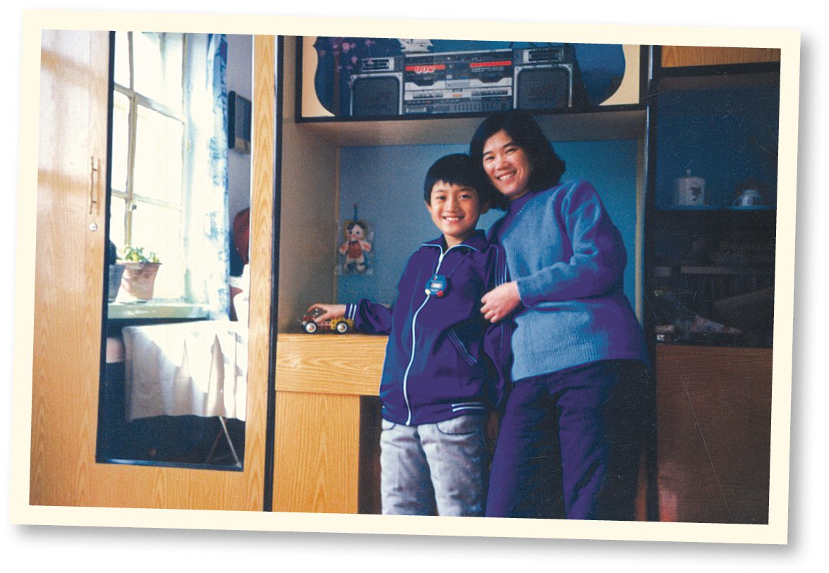 image of a polaroid photo of a mother and son inside a home.
