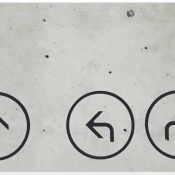 Arrows in a circle pointing up, left and right against grey backdrop.