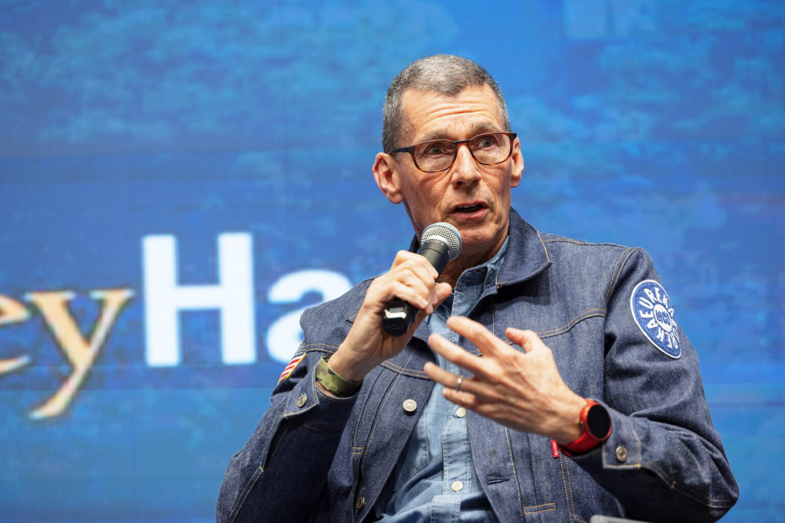 Photo of Chip Bergh, Former CEO of Levi Strauss & Co. sitting and talking at Dean Speaker Series.