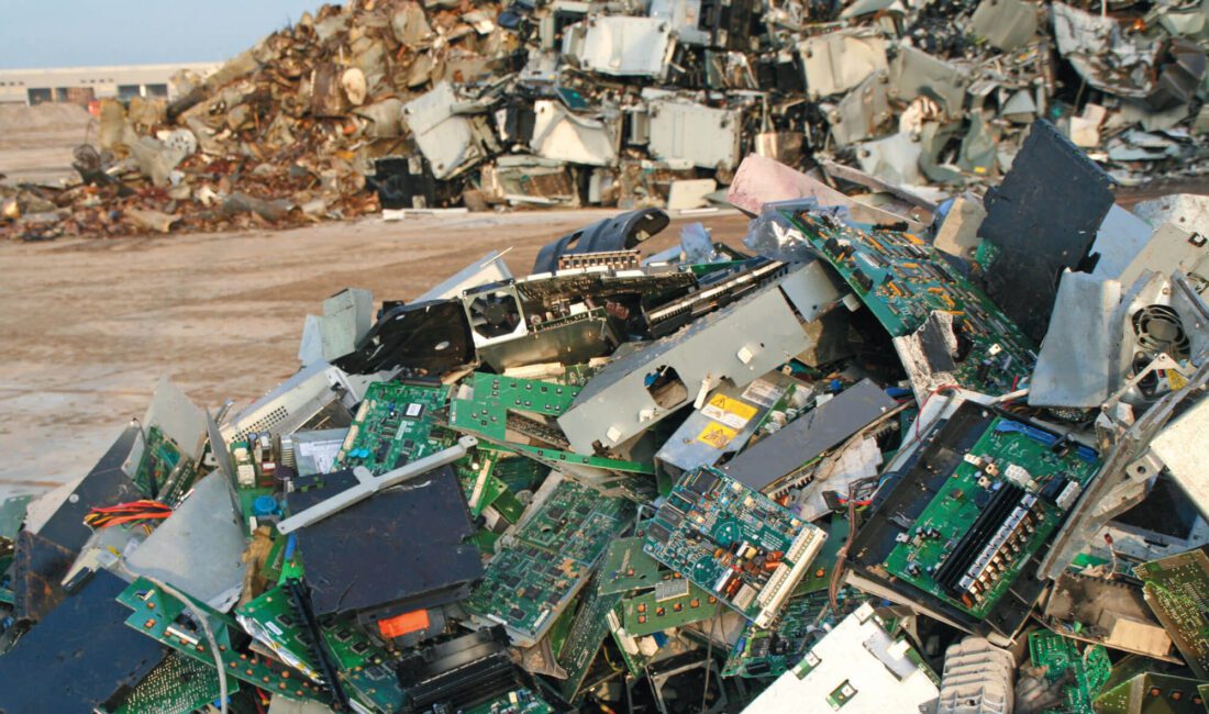 Pile of e-waste, like computers and circuit boards, in a landfill. Credit: istock.