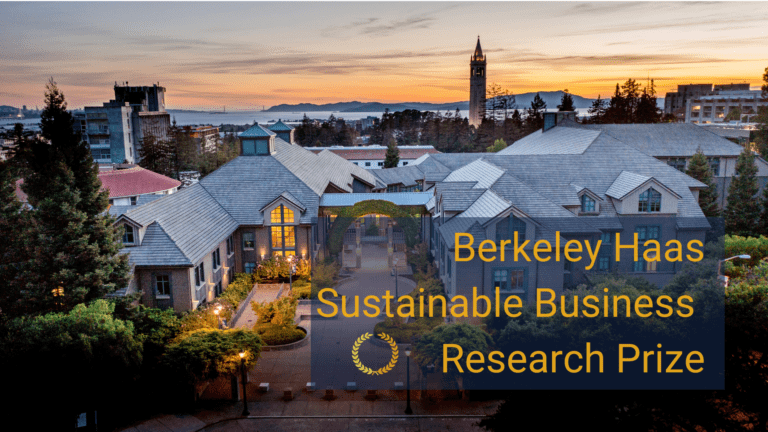 Photo of the Haas campus at sunset. View of Campanile, bay and Bay Bridge. The words "Berkeley Sustainable Business Research Prize" are stamped on bottom right side of the photo.