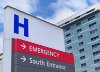 sign for a hospital with a large H.