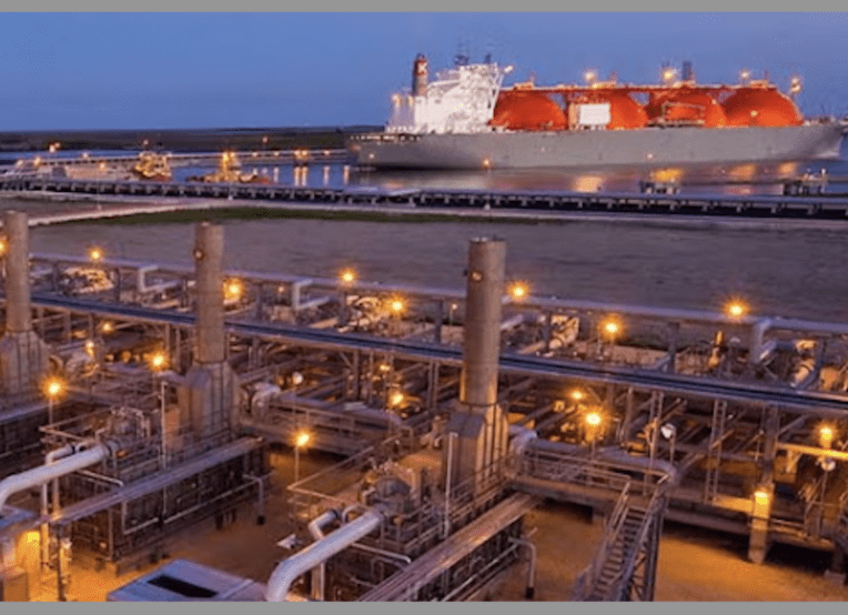 Photo of a ship (looks like it transports oil) at a port