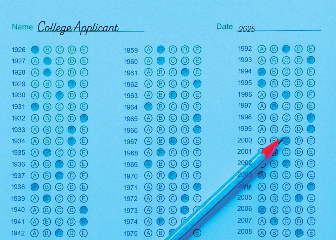 A pencil lying on top of a blue Scantron style test sheet with the words College Applicant and the year 2025 written in script at the top